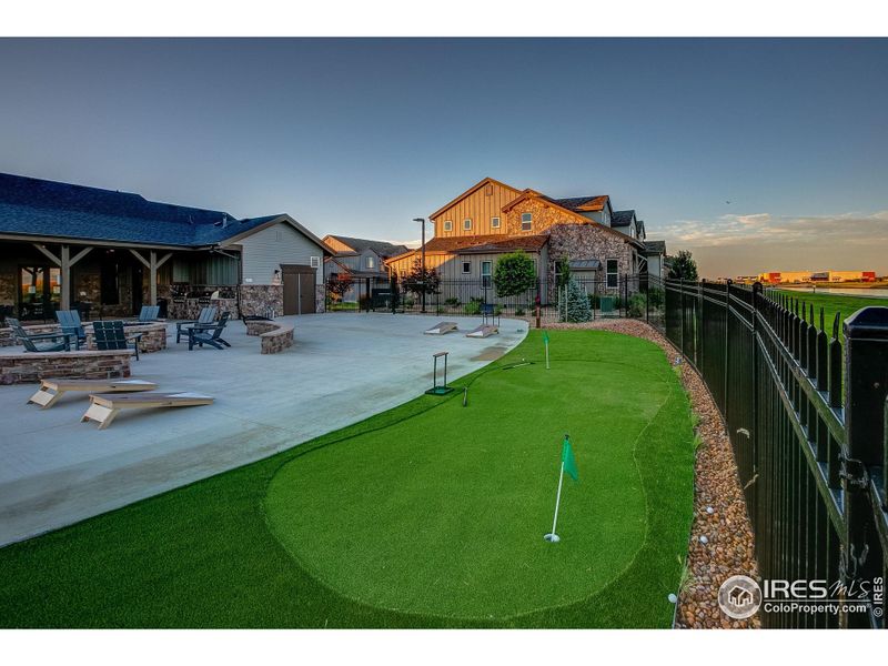 Clubhouse with putting green and oversized, built-in hot tub