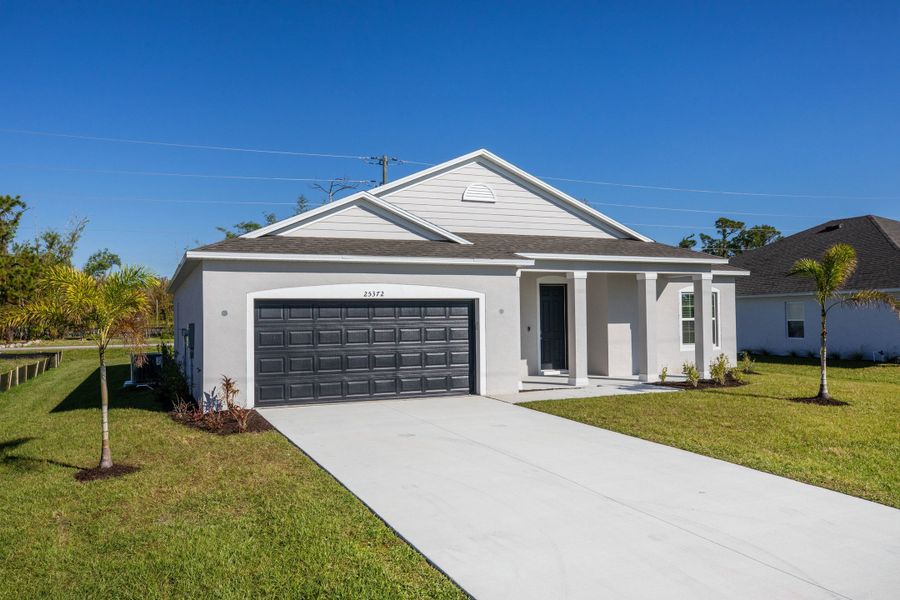 Representative exterior photo of a completed home built from the Clearwater by Maronda Homes in Vero Lake Estates, Sebastian, FL (Image 2). Representative exterior photo of a completed home built from the Clearwater by Maronda Homes in Vero Lake Estates, Sebastian, FL (Image 2).