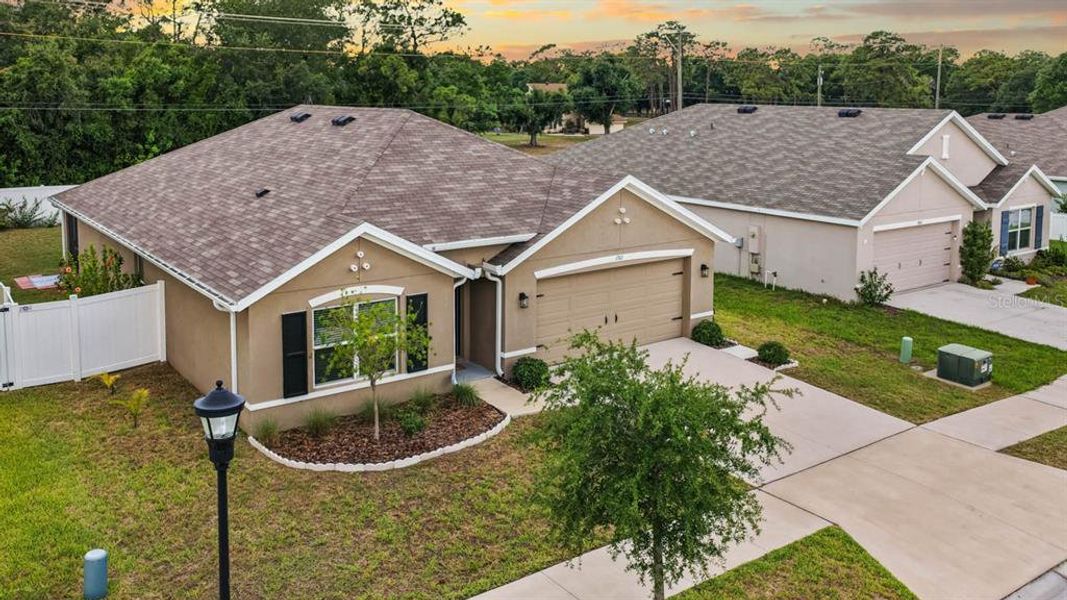 Front exterior of a new home in Brookside, Ruskin, FL, highlighting curb appeal (Image 24).