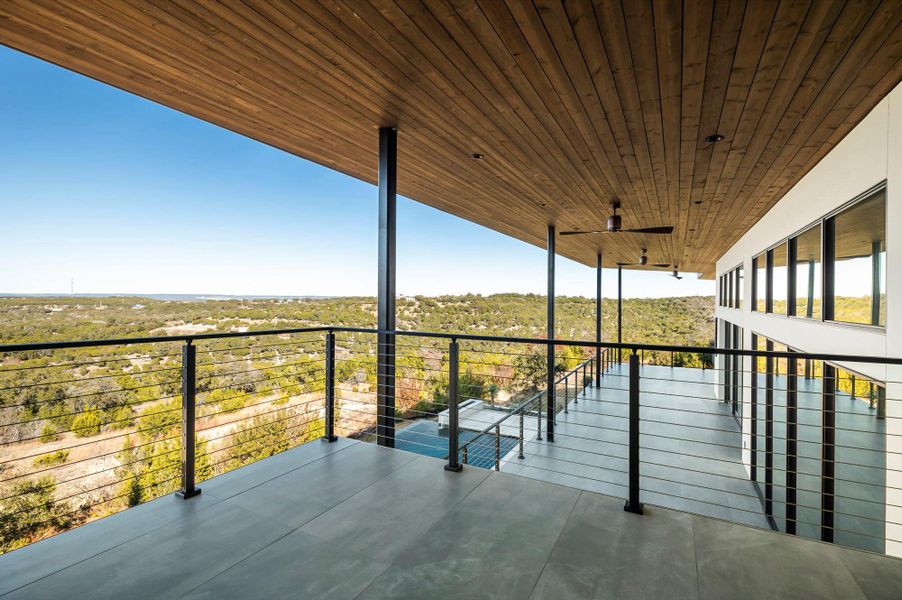 Exterior details and patio area of a home in , Spicewood (Image 29).