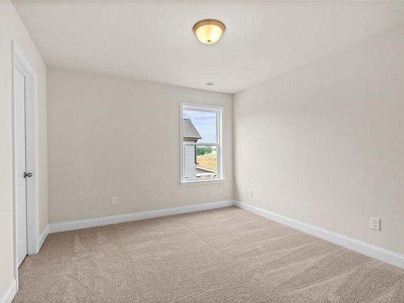 Spacious, unfurnished interior of a new home in Wehunt Meadows, Hoschton (Image 35).