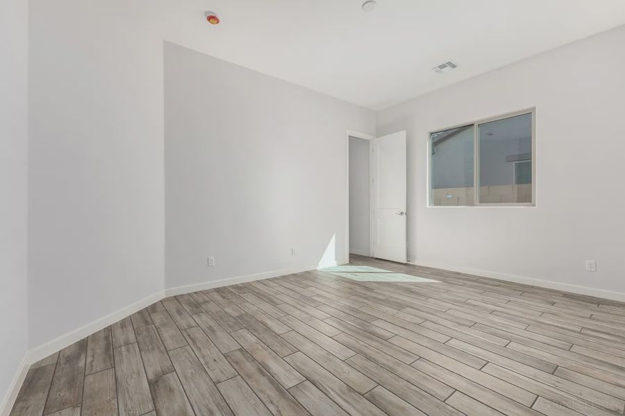 Spacious, unfurnished interior of a new home in Valencia at Granite Vista, Waddell (Image 28).
