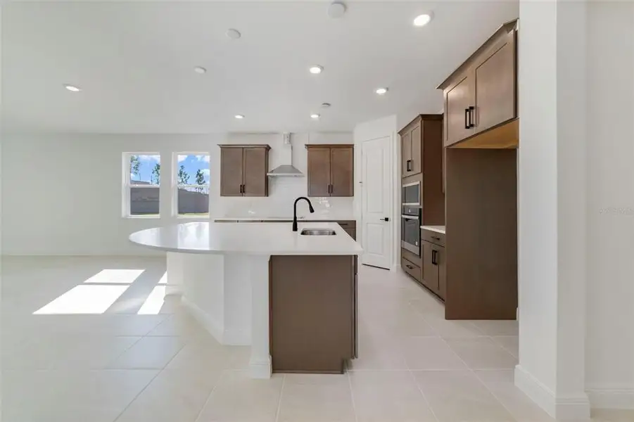 Furnished interior view inside a new home in Vintner Reserve, Clermont (Image 5).