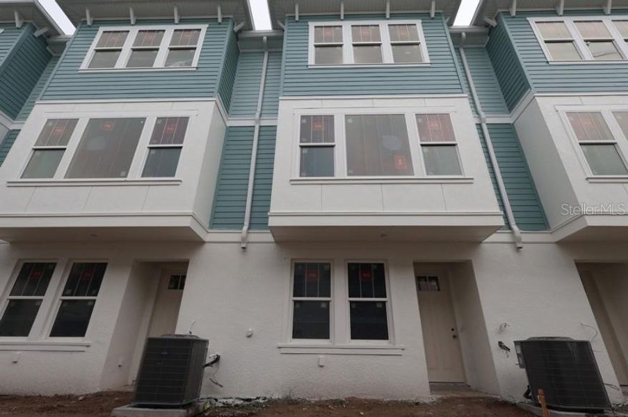In-progress construction of a new home in Towns at Union, St. Petersburg, FL (Image 8).