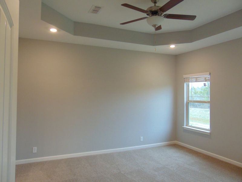 Owners Suite with Trey Ceilinfg and Fan. File Photo Owners Suite with Trey Ceilinfg and Fan. File Photo