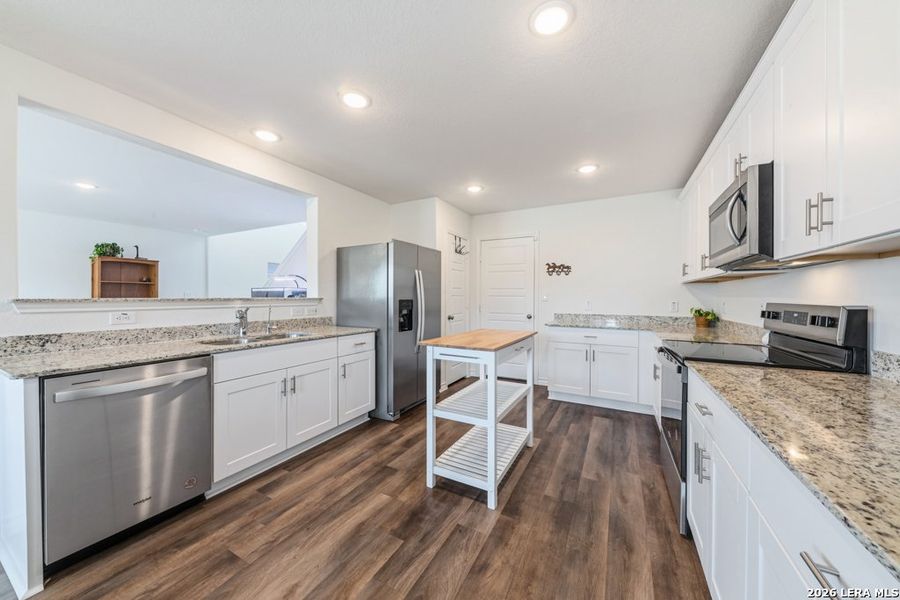 Furnished interior view inside a new home in Cinco Lakes, San Antonio (Image 6).