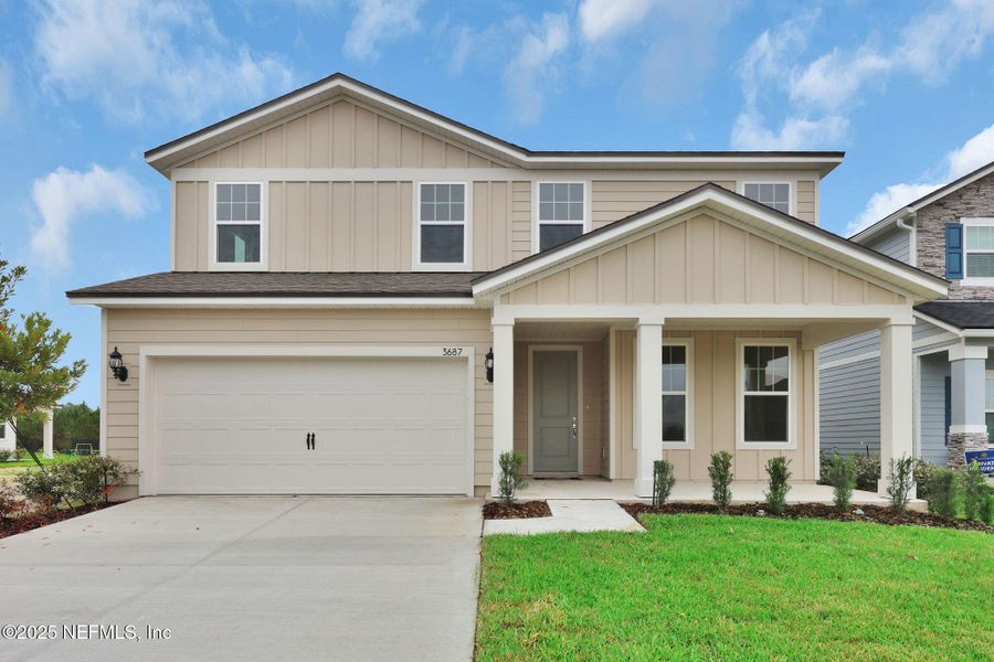 Front exterior of a new home in Hyland Trail, Green Cove Springs, FL, highlighting curb appeal (Image 1). Front exterior of a new home in Hyland Trail, Green Cove Springs, FL, highlighting curb appeal (Image 1).
