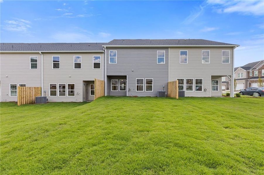 Front exterior of a new home in , Dacula, GA, highlighting curb appeal (Image 1).