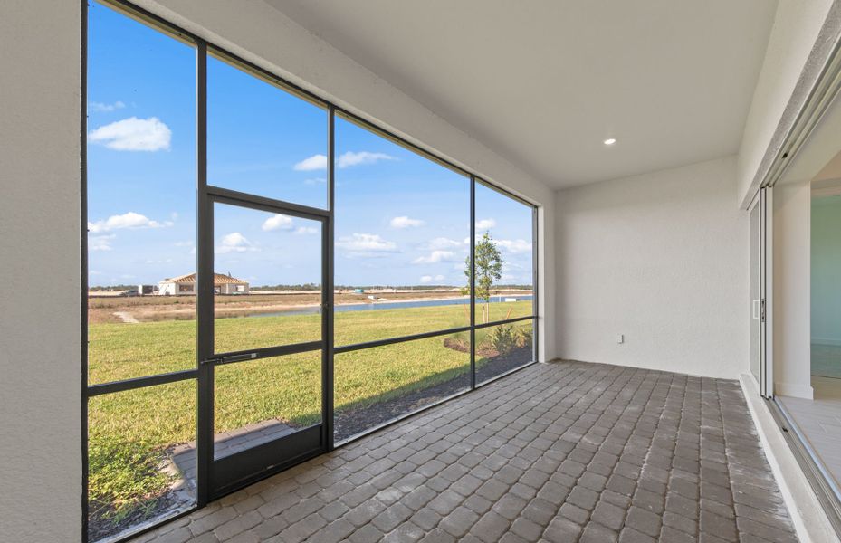 Exterior details and patio area of a home in TerraWalk at Babcock Ranch, Alva (Image 3).