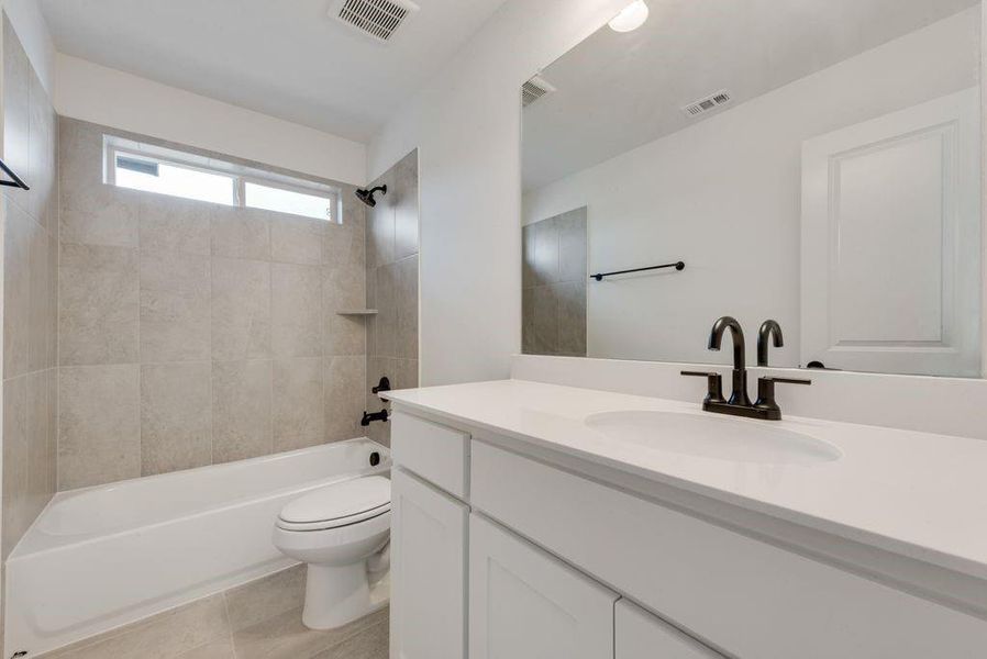 Furnished interior view inside a new home in Cedar Ridge Estates, Grand Prairie (Image 9). Furnished interior view inside a new home in Cedar Ridge Estates, Grand Prairie (Image 9).