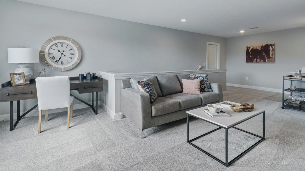 Representative furnished interior of a home built from the Cambridge by Epcon Communities in The Courtyards at Oak Grove, Durham (Image 29).