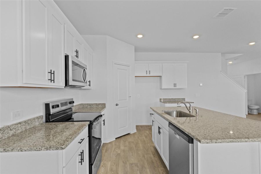 Furnished interior view inside a new home in Palomino, Manor (Image 6).