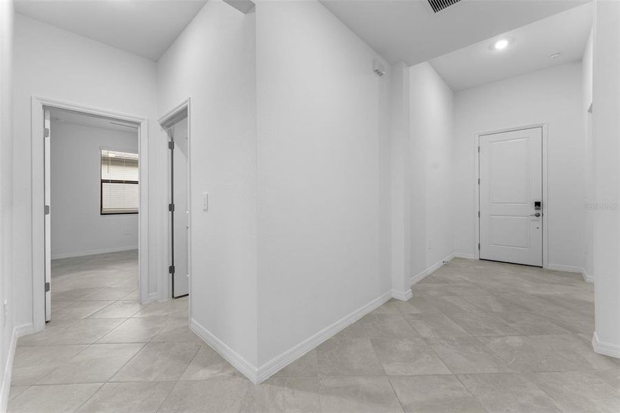 Spacious, unfurnished interior of a new home in , Port Charlotte (Image 29).