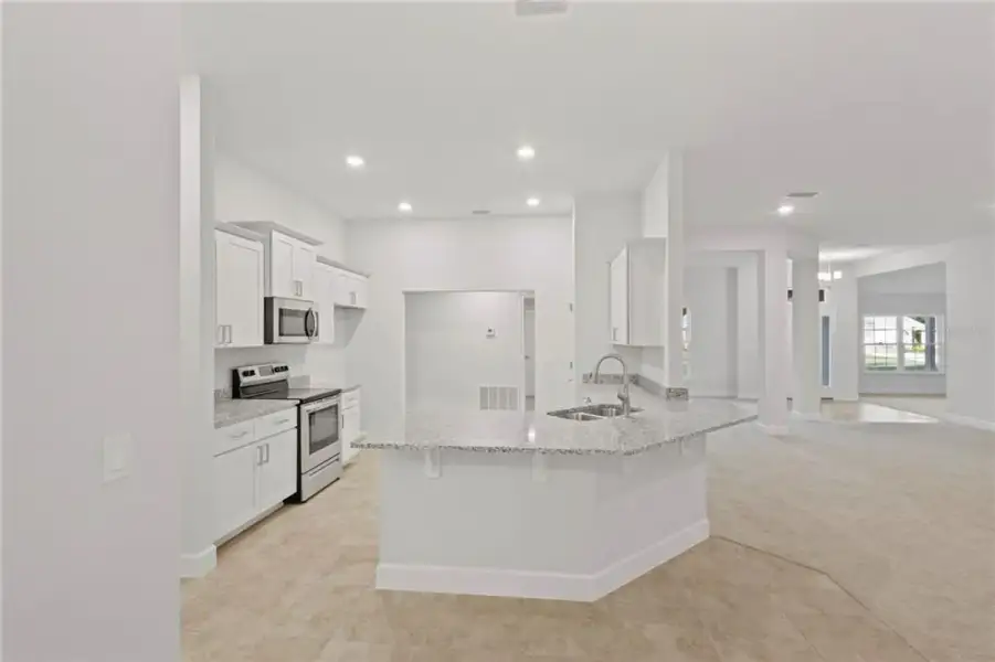 Furnished interior view inside a new home in Royal Highlands, Weeki Wachee (Image 3).