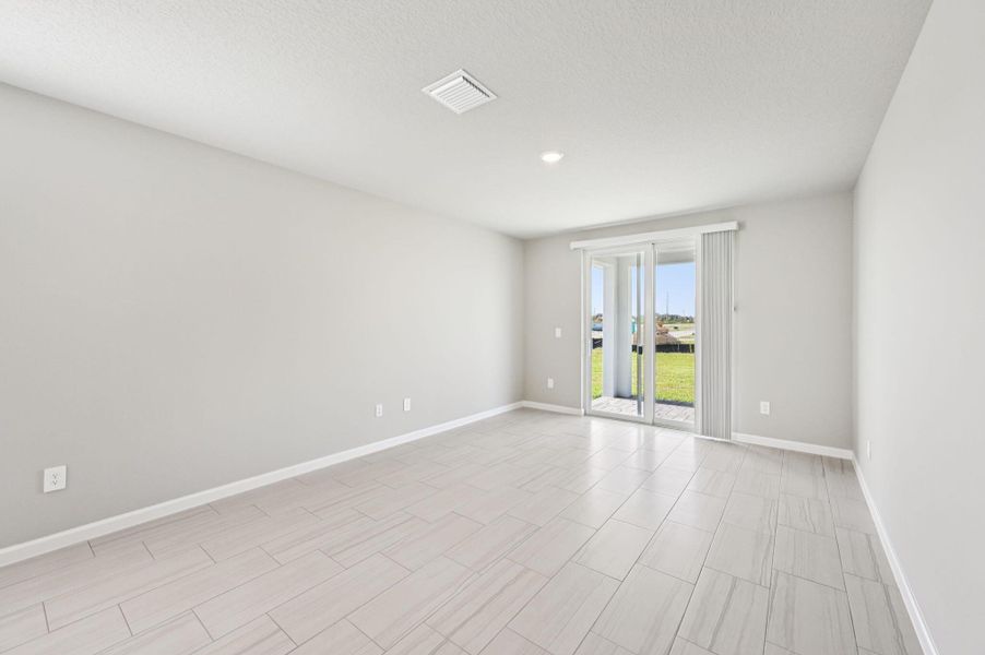 Furnished interior view inside a new home in Hampton Park - Classic Series, Vero Beach (Image 19). Furnished interior view inside a new home in Hampton Park - Classic Series, Vero Beach (Image 19).