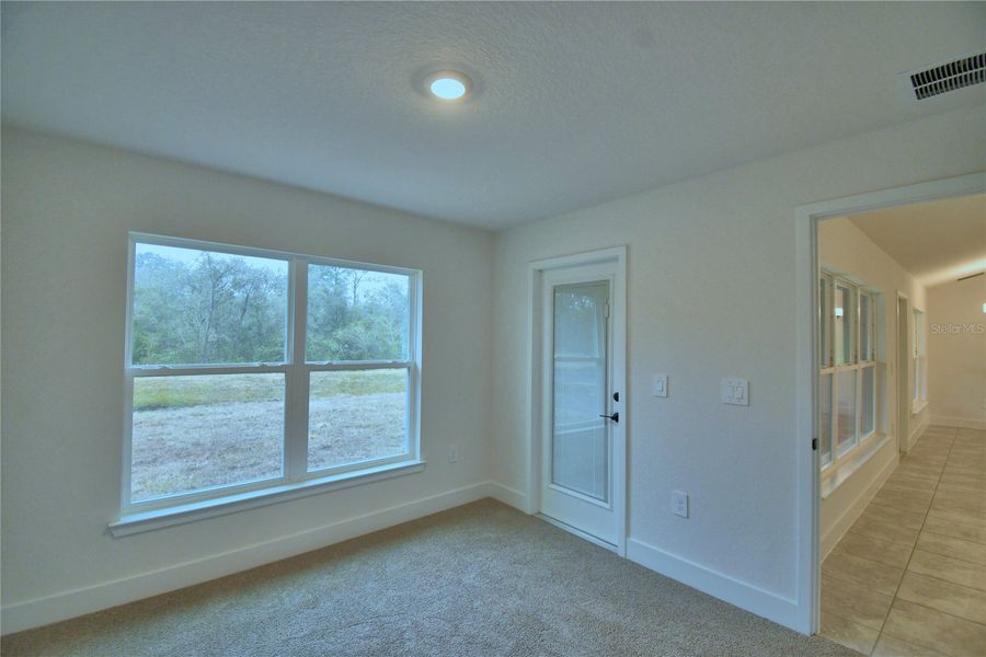 Spacious, unfurnished interior of a new home in Cadence Crossing, Auburndale (Image 39).