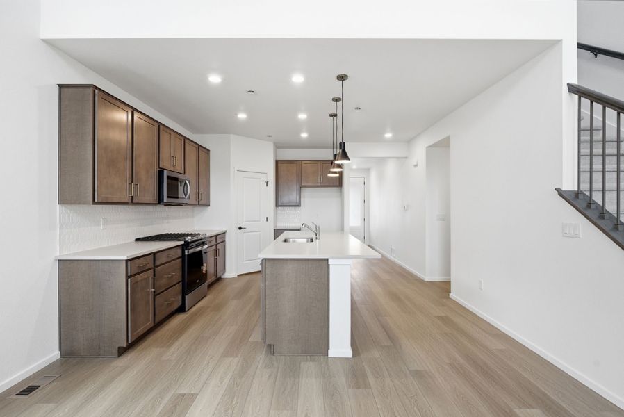 Furnished interior view inside a new home in Harvest Crossing, Aurora (Image 11).