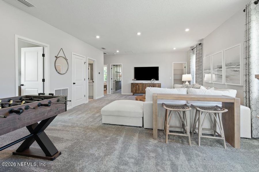 Furnished interior view inside a new home in Seminole Palms, Palm Coast (Image 9).