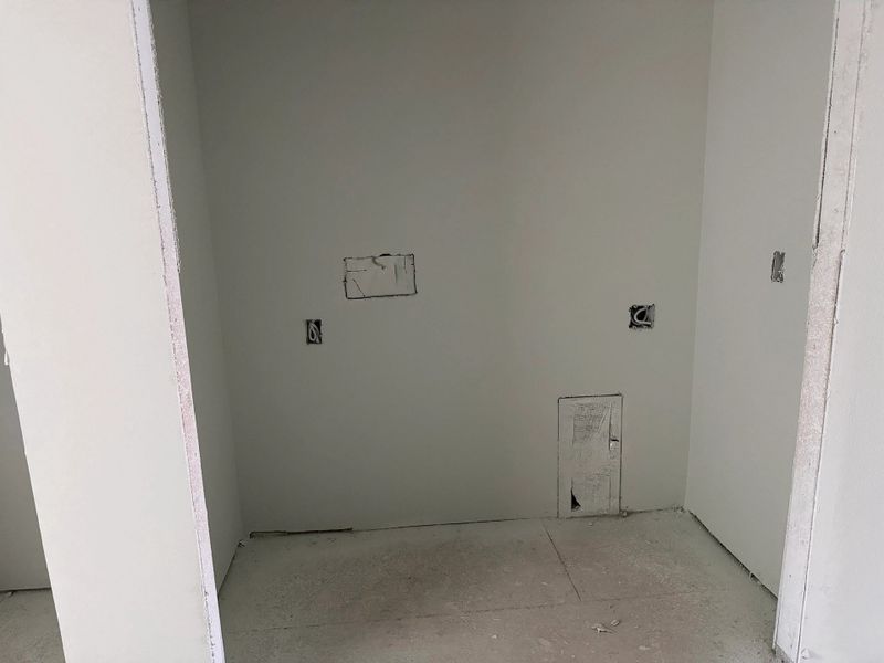 Laundry closet located off the loft space - under construction
