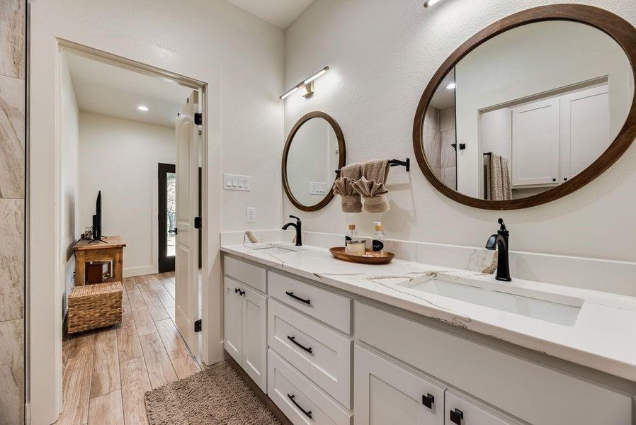 Beautifully crafted spa resort secondary bathroom in this amazing custom built home