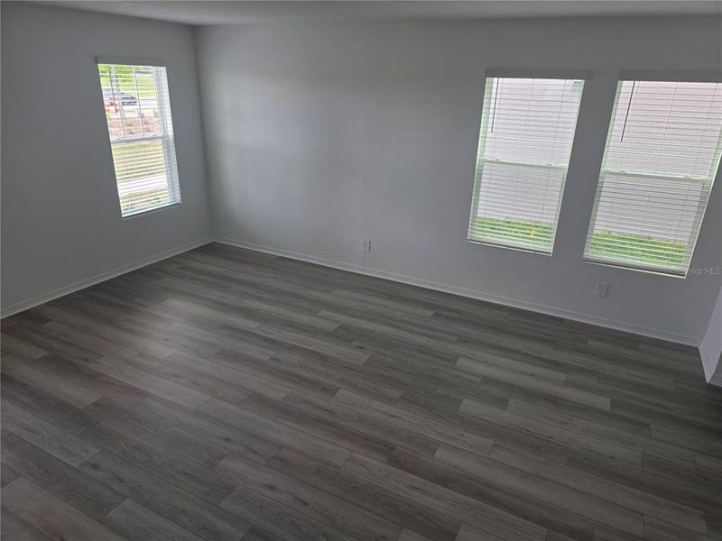 Spacious, unfurnished interior of a new home in The Meadow at Crossprairie Bungalows, St. Cloud (Image 27).