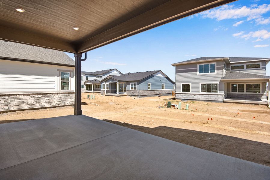 Exterior details and patio area of a home in The Aurora Highlands, Aurora (Image 26).