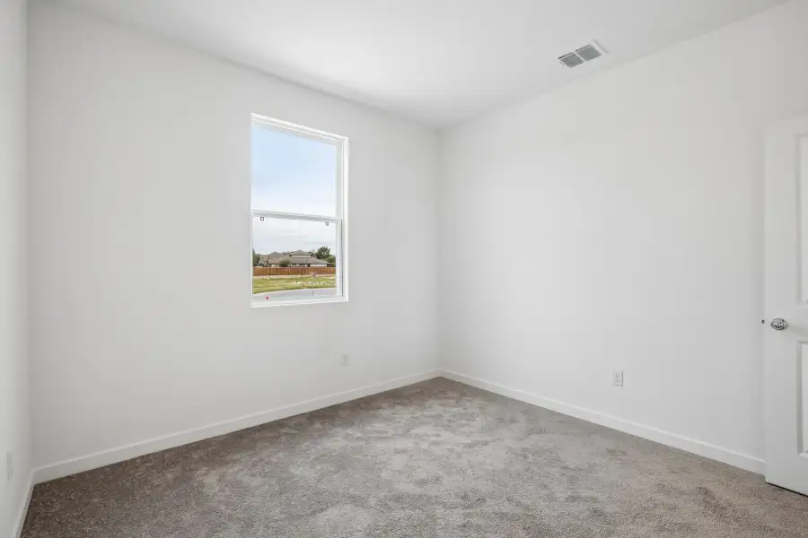 Spacious, unfurnished interior of a new home in Parkton Square, Kyle (Image 26).