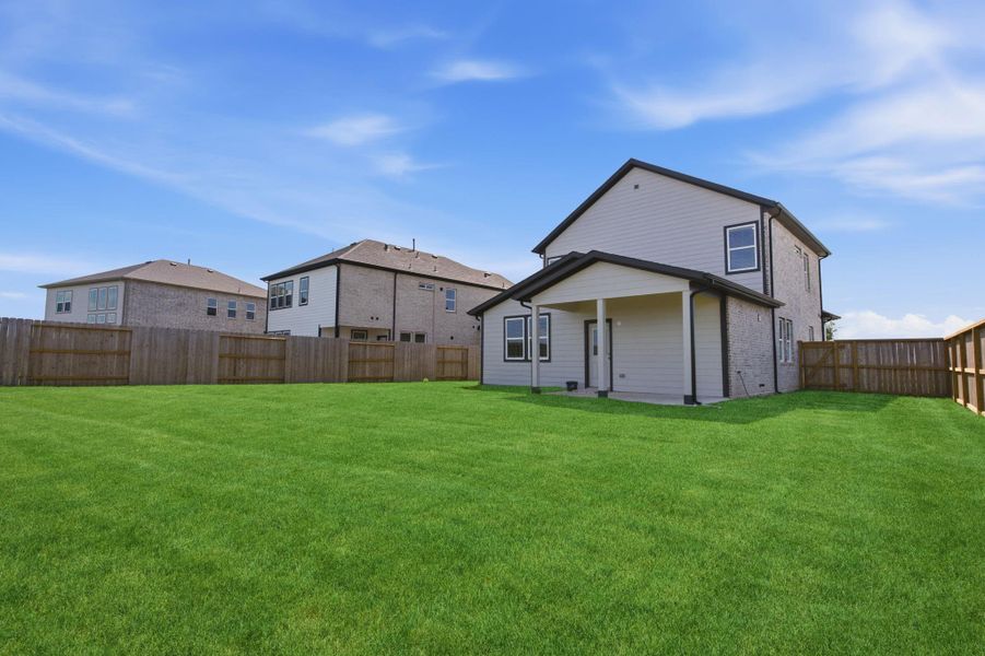 Exterior details and patio area of a home in , Iowa Colony (Image 28).