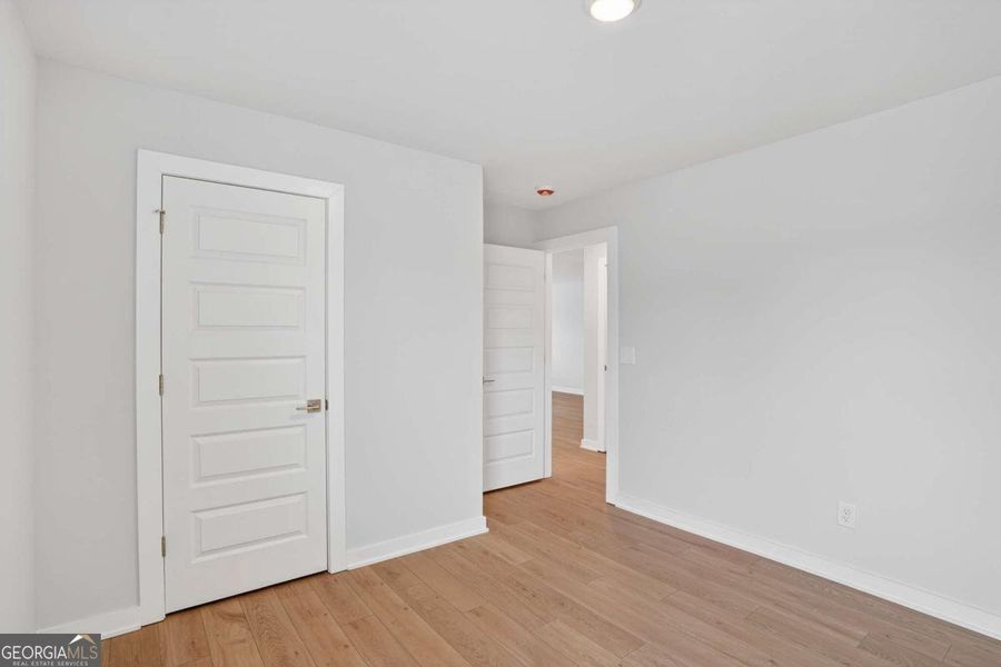 Spacious, unfurnished interior of a new home in The Fairways at Mirror Lake, Villa Rica (Image 57). Spacious, unfurnished interior of a new home in The Fairways at Mirror Lake, Villa Rica (Image 57).