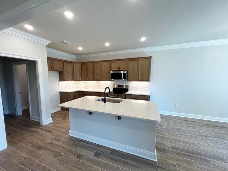 Furnished interior view inside a new home in Natureview, Freeport (Image 6).