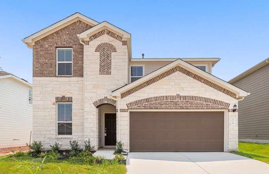 Front exterior of a new home in Patterson Ranch, Georgetown, TX, highlighting curb appeal (Image 21).