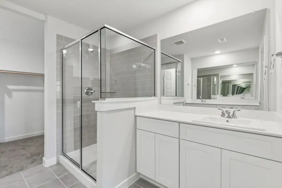 Primary Bathroom in the Harrison home plan by Trophy Signature Homes – REPRESENTATIVE PHOTO Primary Bathroom in the Harrison home plan by Trophy Signature Homes – REPRESENTATIVE PHOTO