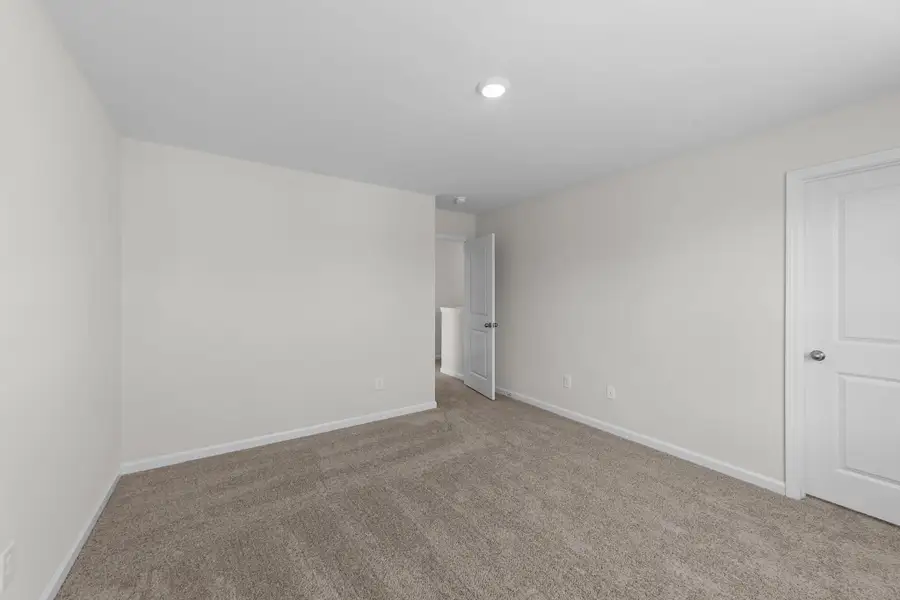 Spacious, unfurnished interior of a new home in Neill's Pointe, Angier (Image 35).