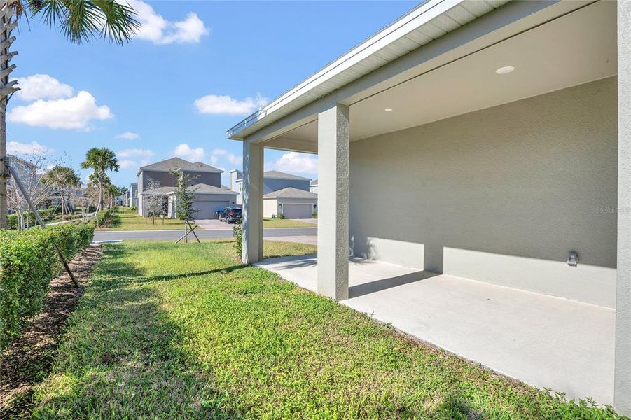 Exterior details and patio area of a home in Rhett's Ridge: Estates Alley Collection, Apopka (Image 3). Exterior details and patio area of a home in Rhett's Ridge: Estates Alley Collection, Apopka (Image 3).