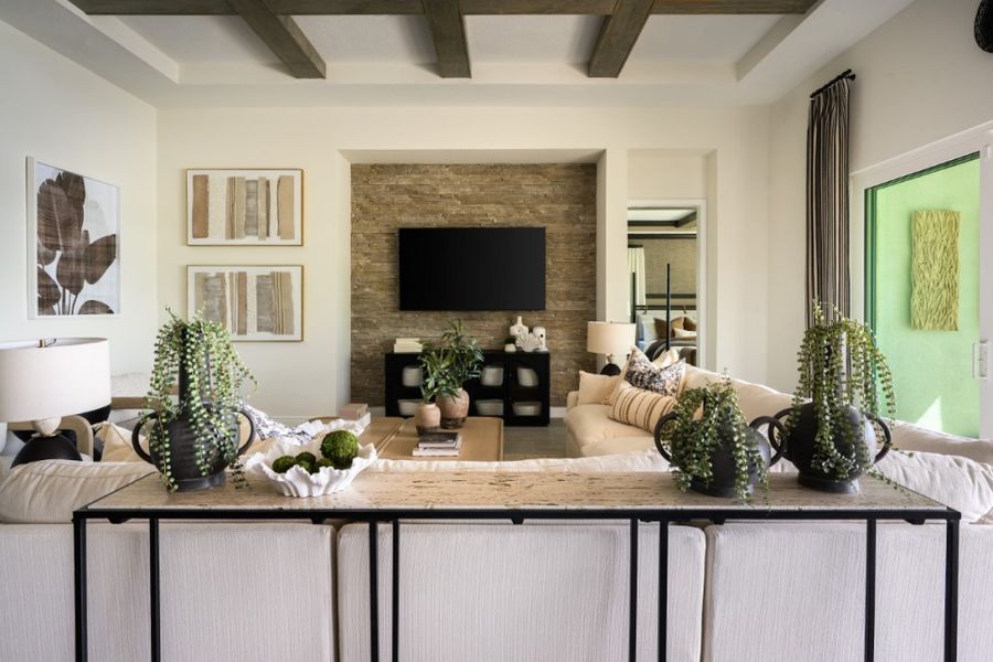 Representative furnished interior of a home built from the Bayport II by Homes by WestBay in Longleaf at Grand Park, Sarasota (Image 17).