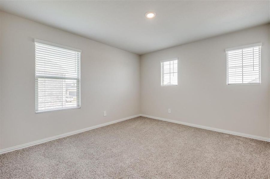 Empty room featuring carpet