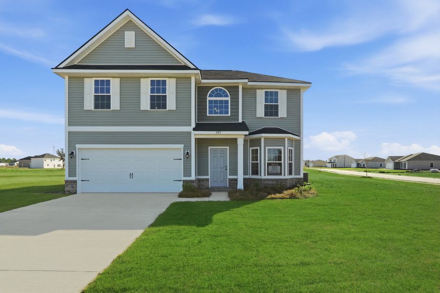 Representative exterior photo of a completed home built from the The Chatman by RTS Homes in The Gardens at 15 West, Hinesville, GA (Image 25).