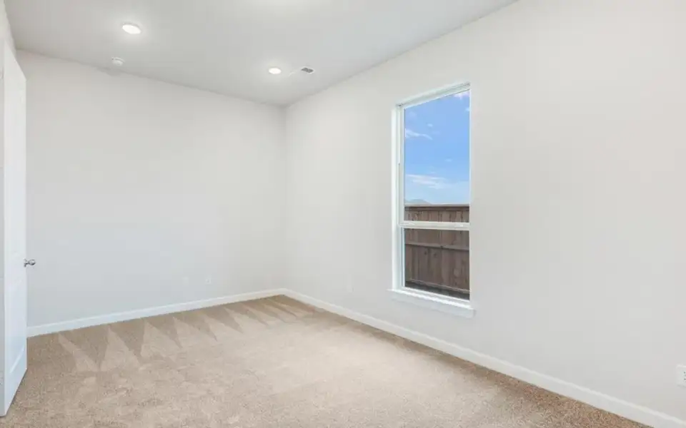 Representative unfurnished interior of a home built from the Santa Barbara by CastleRock Communities in Lakesong, Grand Prairie (Image 23).