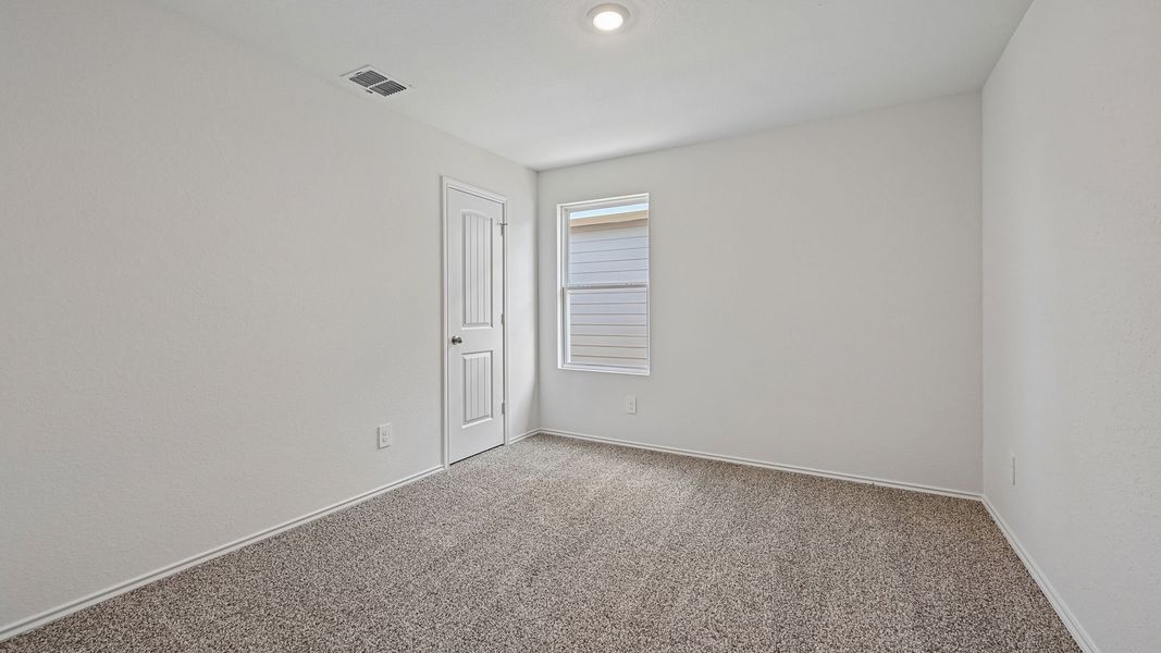 Spacious, unfurnished interior of a new home in Watermill, Uhland (Image 25).
