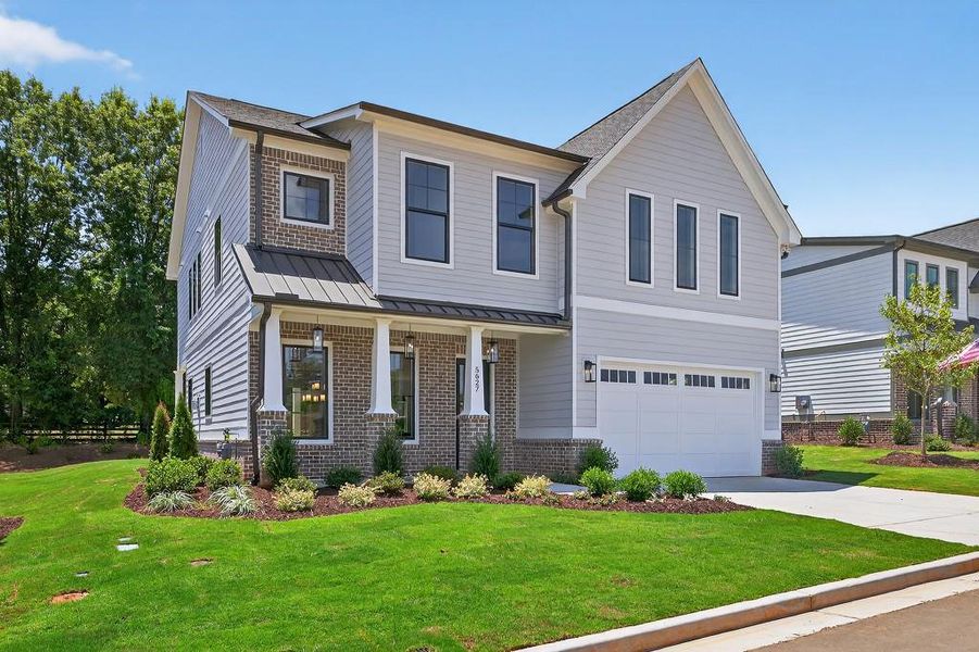 Front exterior of a new home in Livingstone Park, Kennesaw, GA, highlighting curb appeal (Image 1).