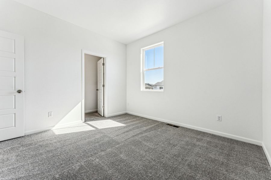 Representative unfurnished interior of a home built from the Sedalia by Taylor Morrison in Trailstone, Arvada (Image 40).