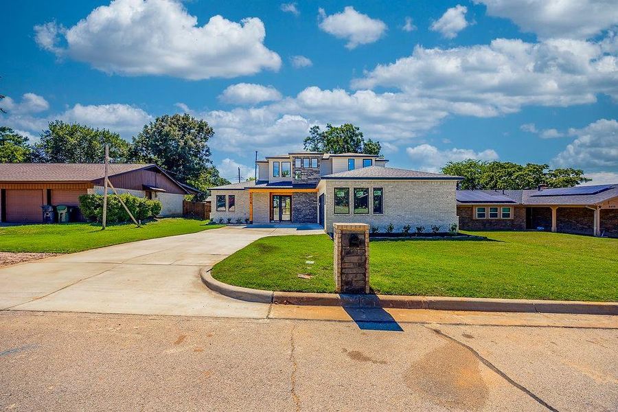 Front exterior of a new home in , Arlington, TX, highlighting curb appeal (Image 22). Front exterior of a new home in , Arlington, TX, highlighting curb appeal (Image 22).