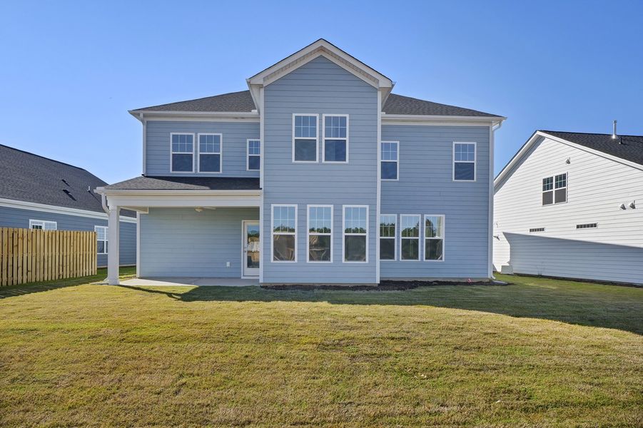 Exterior details and patio area of a home in Grand Park, Leland (Image 21).
