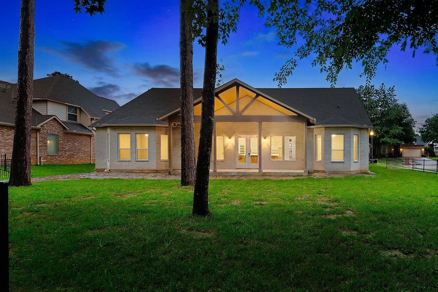 Exterior details and patio area of a home in , Conroe (Image 18).