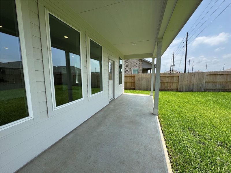 Exterior details and patio area of a home in Anniston, Katy (Image 23).