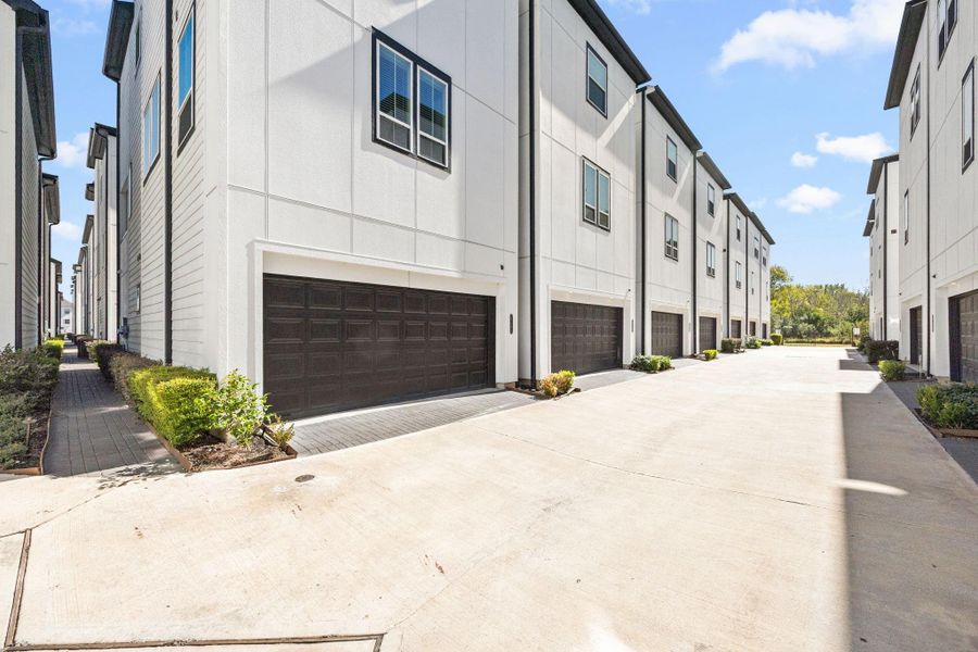 Exterior details and patio area of a home in The Corner At Buffalo Pointe, Houston (Image 26).