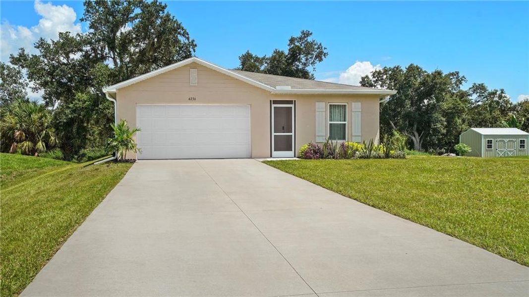 Front exterior of a new home in , North Port, FL, highlighting curb appeal (Image 27).