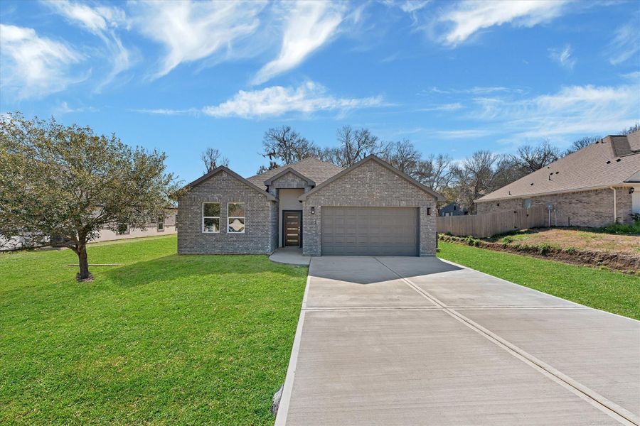 Front exterior of a new home in , Montgomery, TX, highlighting curb appeal (Image 19).