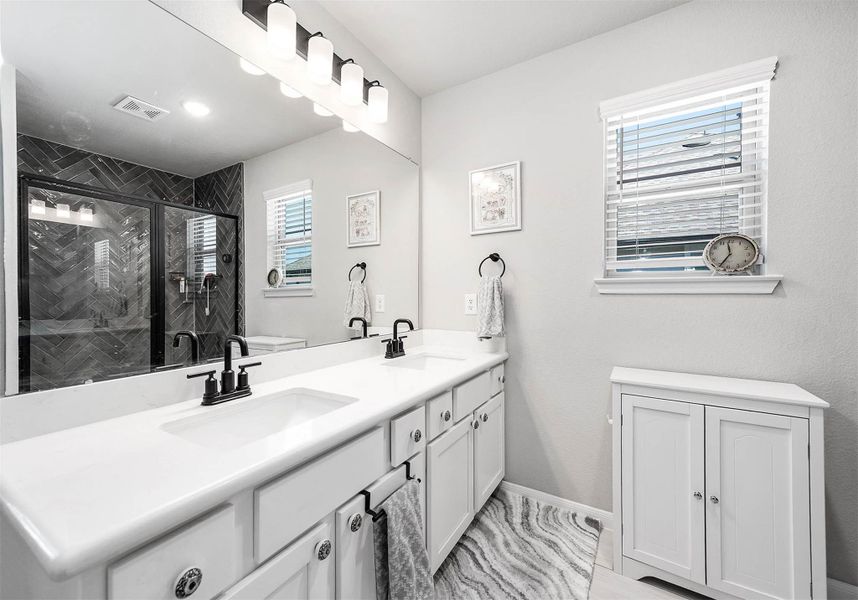 Primary Bathroom with double sinks.