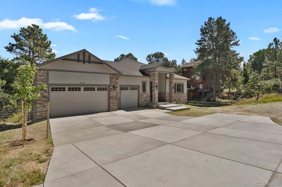 Front exterior of a new home in , Parker, CO, highlighting curb appeal (Image 2). Front exterior of a new home in , Parker, CO, highlighting curb appeal (Image 2).